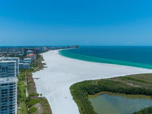 NEW OWNERS! End Unit w/ Top of Line Finishes / Wide Gulf Views! - main image