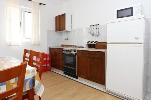 廚房, Apartments by the sea Igrane, Makarska - 10033 in 伊加勒