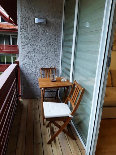 Kalno namai - apartamentas Juodkranteje