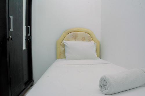 Homey and Tidy 2BR Apartment at Pancoran Riverside By Travelio