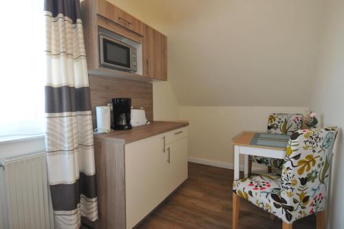 kuchyně, Apartmenthaus am Watt Busum in Busum