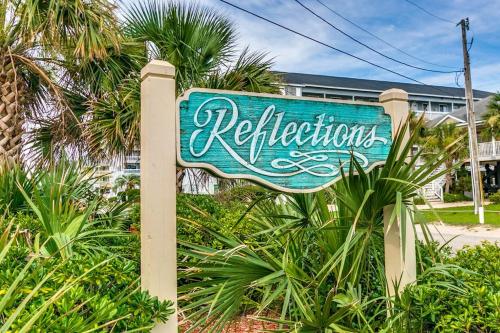 Beach Getaway with Pool Access and Patio with Ocean View!