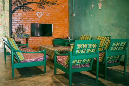 Shared lounge/TV area, Voyage Home in Malacca