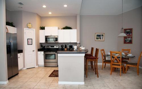 Four-Bedroom Pool Home Davenport in Davenport