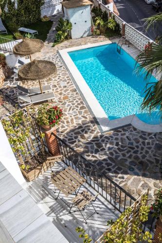 Kert, Boutique X Benalmadena Pueblo in Rancho Domingo