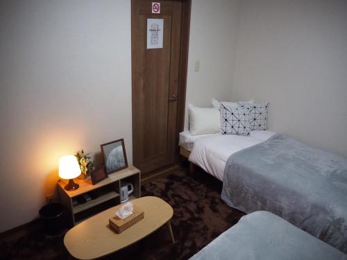 Triple Room with Shared Bathroom