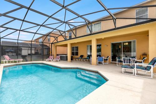 Tiger Lilly- 6 bedroom vacation home in the Disney area with a private pool and hot tub with a spacious patio - image 3