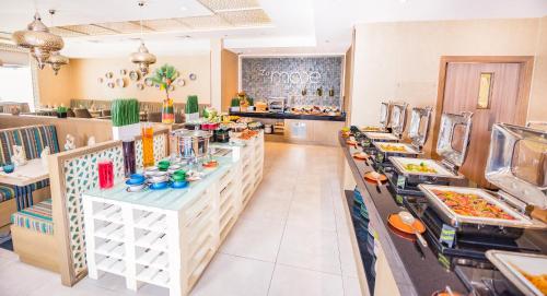 MENA Plaza Hotel Albarsha - Restaurant