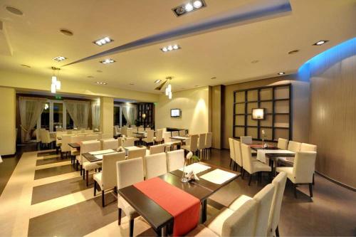 레스토랑, Ioannou Resort in 프톨레마이다