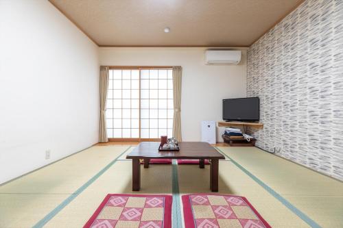 Quadruple Room with Shared Bathroom