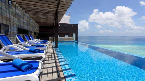 Swimming pool, Arena Beach Hotel at Maafushi in Maldive Islands