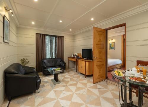 Sarovar Portico Kalupur Ahmedabad - 공용 라운지/TV 시청 구역