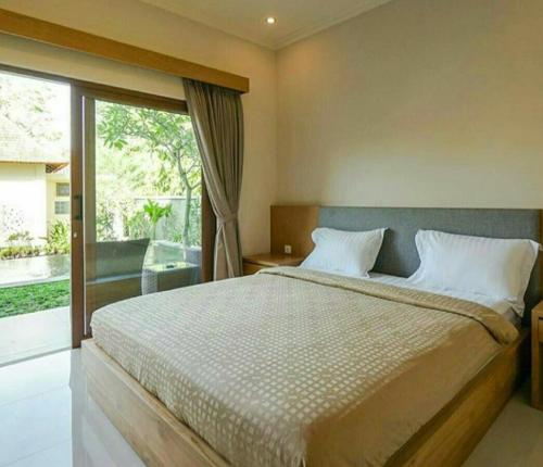 Arnaya Homestay Arnaya Homestay is perfectly located for both business and leisure guests in Bali. The property features a wide range of facilities to make your stay a pleasant experience. Service-minded staff will w
