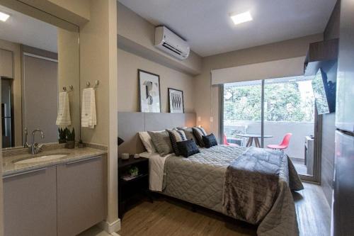 BHaus Vila Madalena Eside - Studio Premium com Varanda - Cama Queen - 3o andar - Rua Girassol - Piscina no Rooftop - Academia - Lavanderia pay per use - es1, São Paulo (fotografie 2)