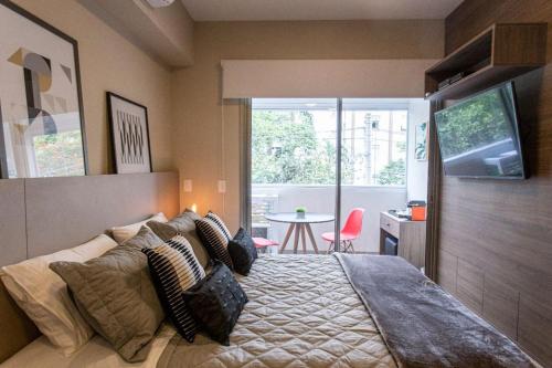BHaus Vila Madalena Eside - Studio Premium com Varanda - Cama Queen - 3o andar - Rua Girassol - Piscina no Rooftop - Academia - Lavanderia pay per use - es1, São Paulo (fotografie 7)