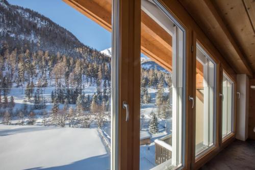 Ruhige Maisonette Dachwohnung mit Blick ins Grüne - Apartment - Pontresina