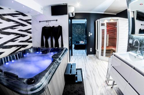 Appart Hotel GLAM88 Suites avec SPA et Sauna Privatif