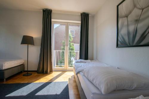 RAJ Living - 1 , 3 and 4 Room Apartments - 20 min Messe DUS & Airport DUS