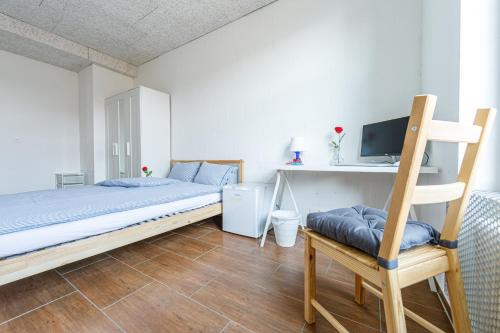 YELLOW INN - SIMPLE ROOMS -- OLMA Messen & Autobahn 1 Min, HSG 6 Min, Spital 7min, günstige Parkplätze