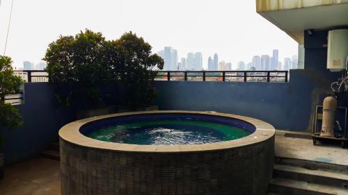 Cozy and Minimalist 2BR at Marbella Kemang Apartment By Travelio