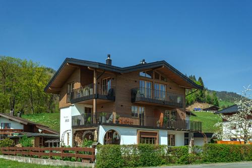 Ferienhaus Hetzenauer - Apartment - Kössen