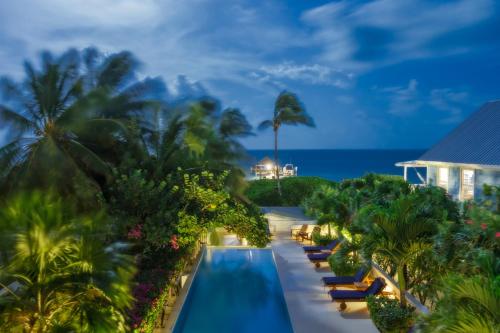 Weezie's Ocean Front Hotel and Garden Cottages - Caye Caulker Weezie's Ocean Front Hotel and Garden Cottages - Caye Caulker