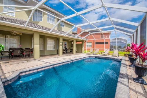 Sunny Large Pool in Floridian Retreat - main image
