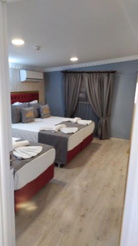 Triple Room room in Rhythm Hotel