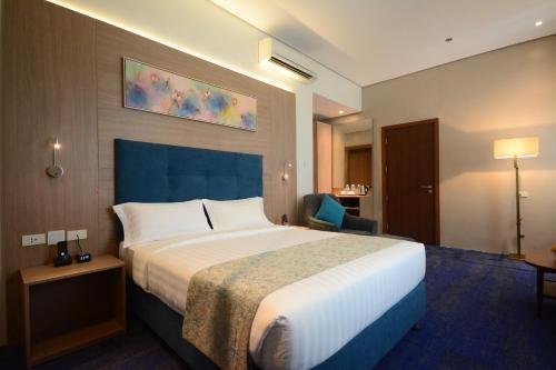 침대, 블루 로터스 - 다목적 호텔 (Blue Lotus Hotel) near 마티나 타운 스퀘어