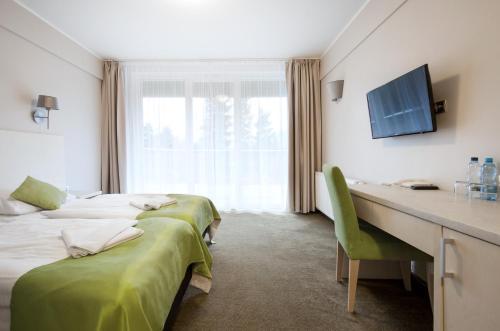 Double Room + One Single Bed with Balcony Comfort