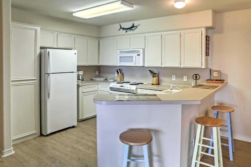 Condo with Pool and Bay-View Balcony Walk to Beach! - image 9