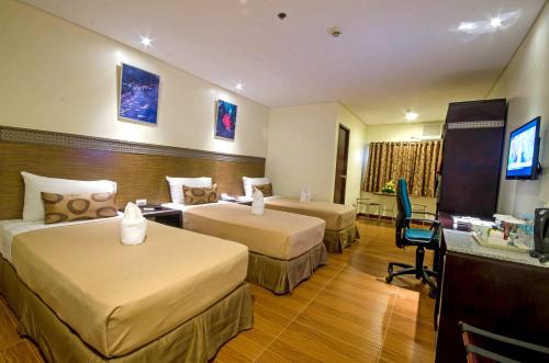 Deluxe Triple Room room in Fersal Hotel Puerto Princesa