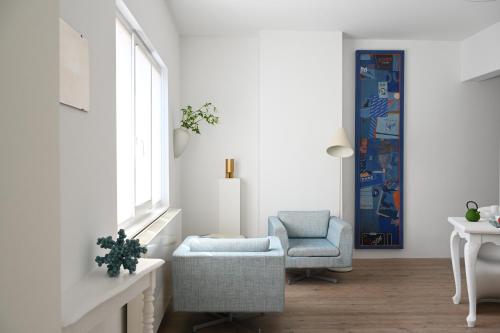 sleeping with the eyes wide open, an artistic stay in a former shipyard, nestled in a magnificent photogenic riverscape chambre d'hôte Buitenland