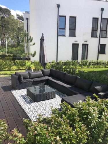 Apartament Baltica z ogródkiem - w ustronnym miejscu tuż przy plaży