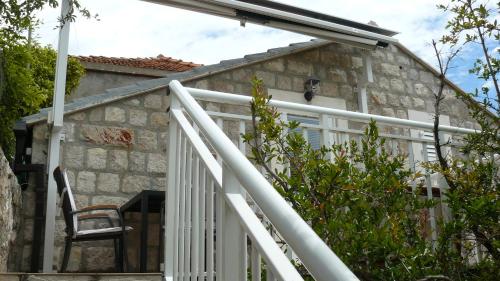 One-Bedroom Apartment with Balcony and Garden View - Attic image 10