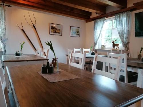 Restoran, Boddenhus auf Rügen - Ferienwohnungen und Pension (Boddenhus auf Rugen - Ferienwohnungen und Pension) in Rappin