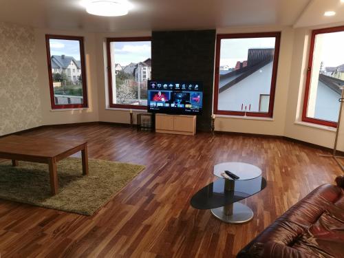 Saulėlydžio apartamentai Saulėlydžio apartamentai