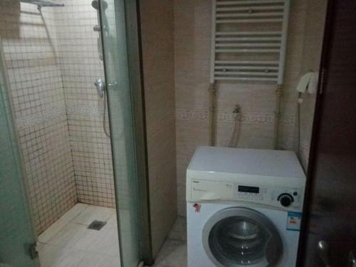 Xinjinshan Yijia Condo Hotel - image 2