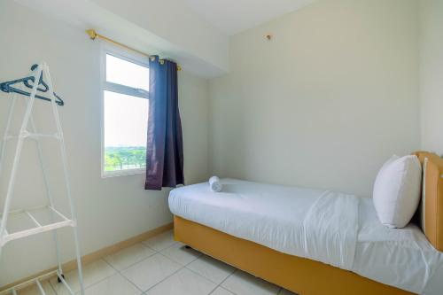 Homey 2BR Apartment at Springlake Summarecon Bekasi By Travelio - image 2