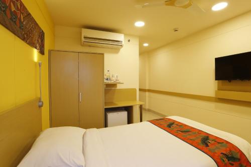 ginger hotel vapi Book Ginger Guwahati main image 1