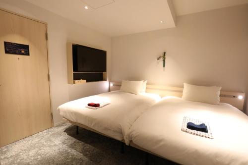 Gen Hotel Kamakaura - Tap to explore photos