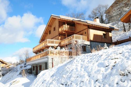 Chalet Hermine Blanche Luxury Chalet Close to City Center Sauna & Jacuzzi gîte à louer Meribel Mottaret