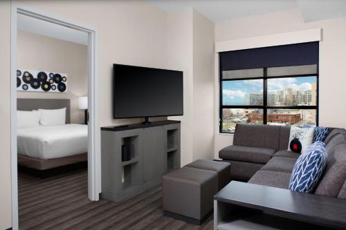 One-Bedroom Specialty Suite with Two Queen Beds with Sofa Bed, Kitchen and Roll-In Shower - Disability Access