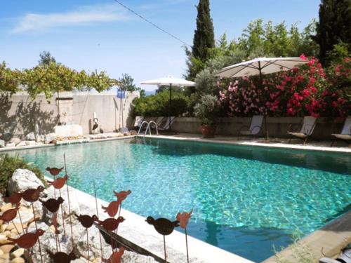 Appartement de 2 chambres avec piscine partagee jardin amenage et wifi a Oppede - Location saisonnière - Oppède