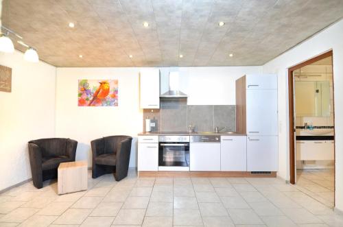 W-Apartments - Spacious Parking, EV-Station & Private Outdoor Area with Playground in Offenburg, Deutschland