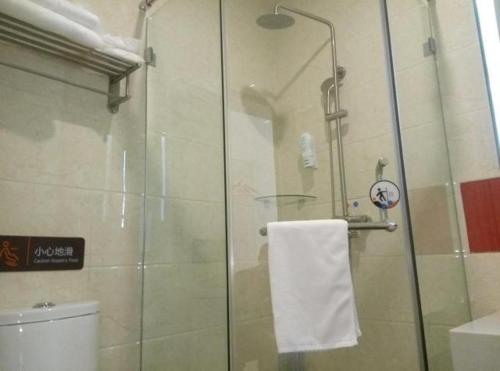 a bathroom with a shower stall and a toilet, 7 Days Premium Beijing Fengtai Wumei Market Branch in Beijing