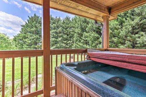Log Cabin with Deck and Hot Tub 5 Mi to Dollywood! in Pigeon Forge, USA
