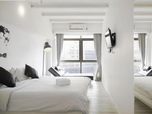 3ฮาว แอท สุขุมวิท21 (3 Howw Hostel at Sukhumvit 21) in กรุงเทพ