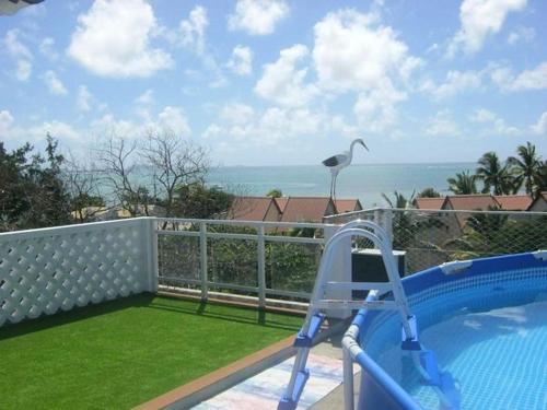 . 2 bedrooms appartement at Grand Gaube 200 m away from the beach with sea view furnished terrace and wifi