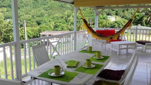 Maison de 5 chambres a Bas Vent a 500 m de la plage avec vue sur la mer jardin amenage et wifi - Location saisonnière - Deshaies